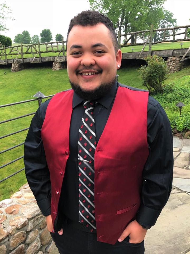 A young man wearing a BoTie neck tie